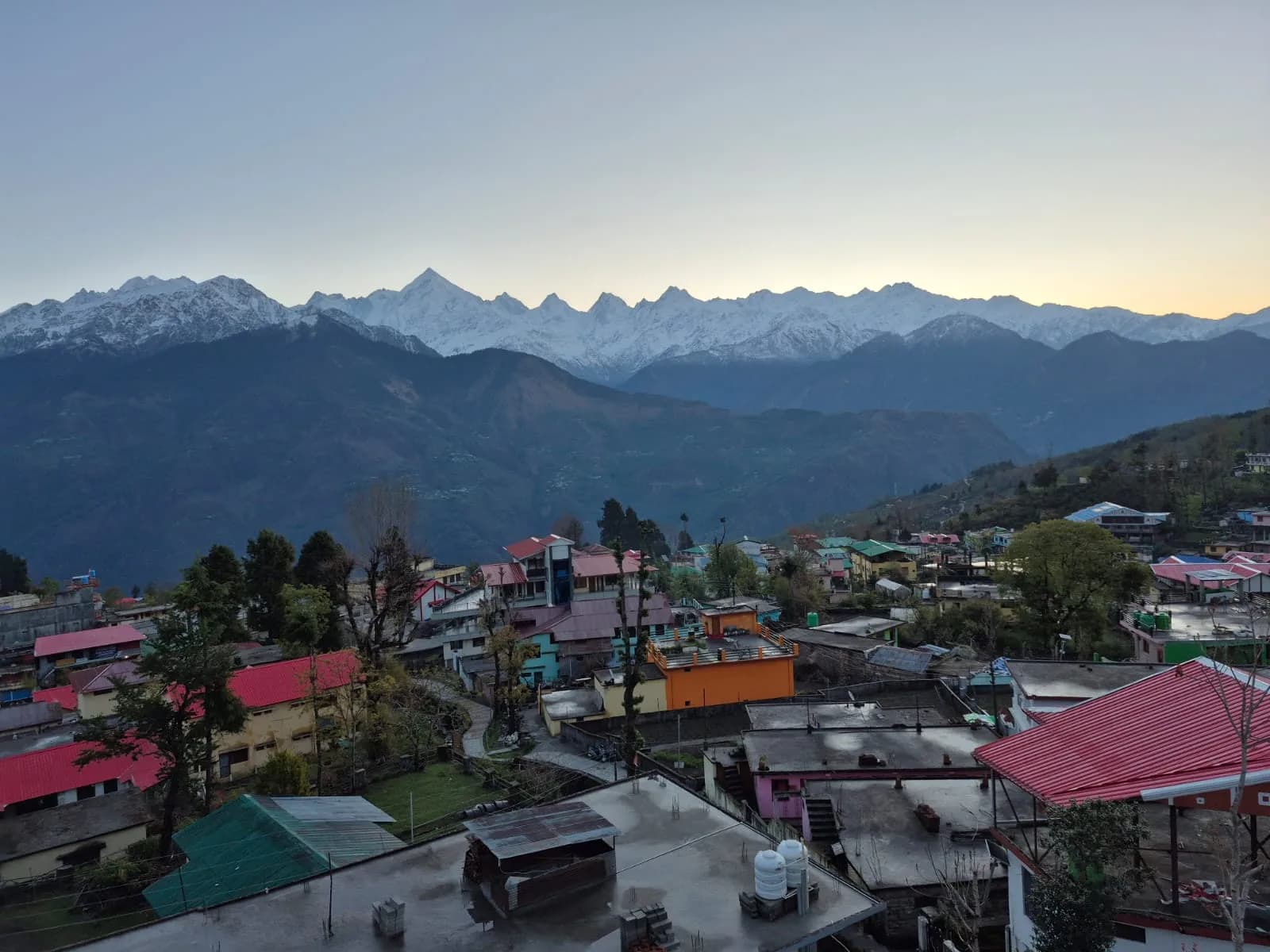 Panoramic Panchachuli peaks at dusk from the hotel balcony